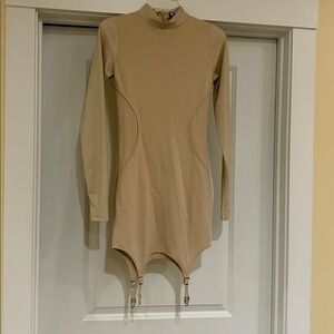 Suspender Dress. NWT. Light tan color. Size 10. Bodycon. Pleather sleeves.